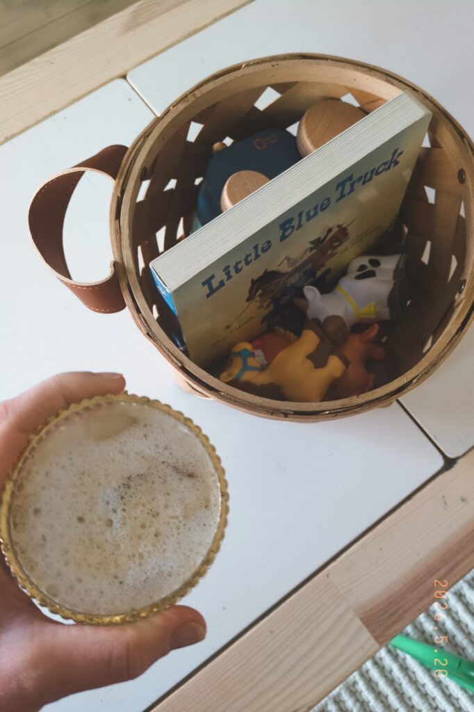 Holding coffee over morning basket